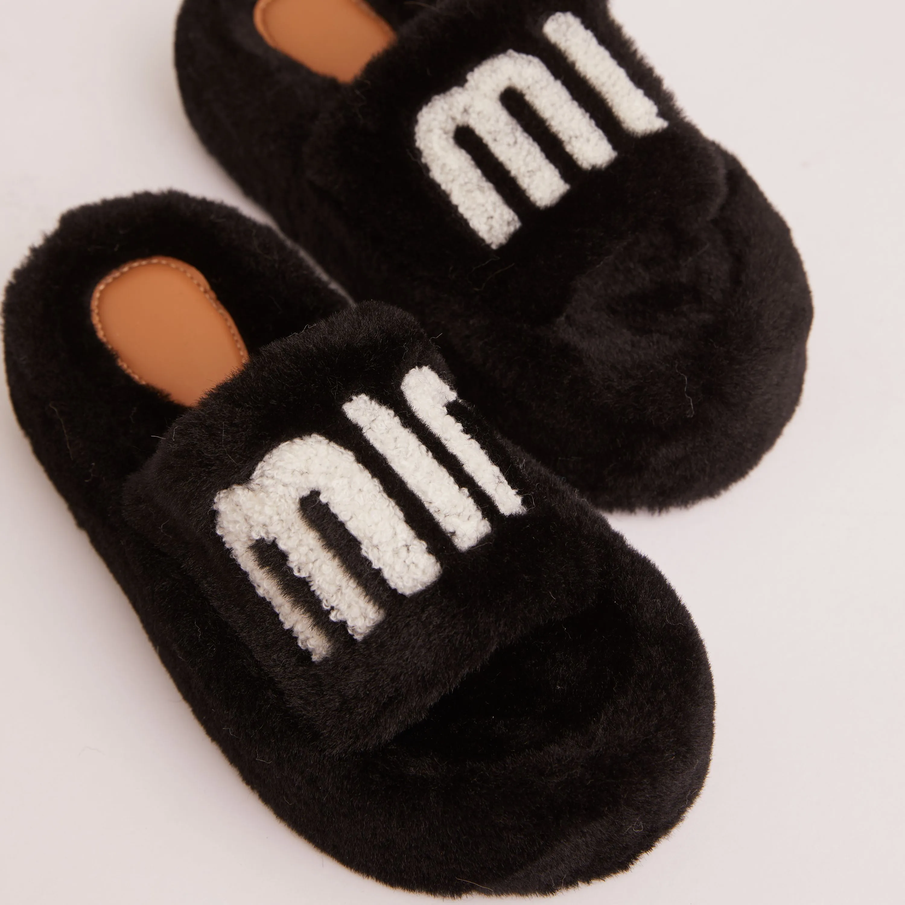 Chick Logo Detail Flat Slipper In Black Faux Fur