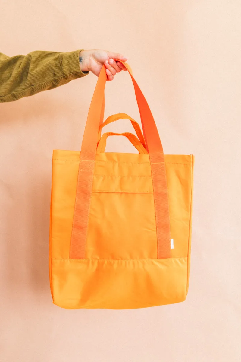 INFLUX PADDED BAG IN ORANGE