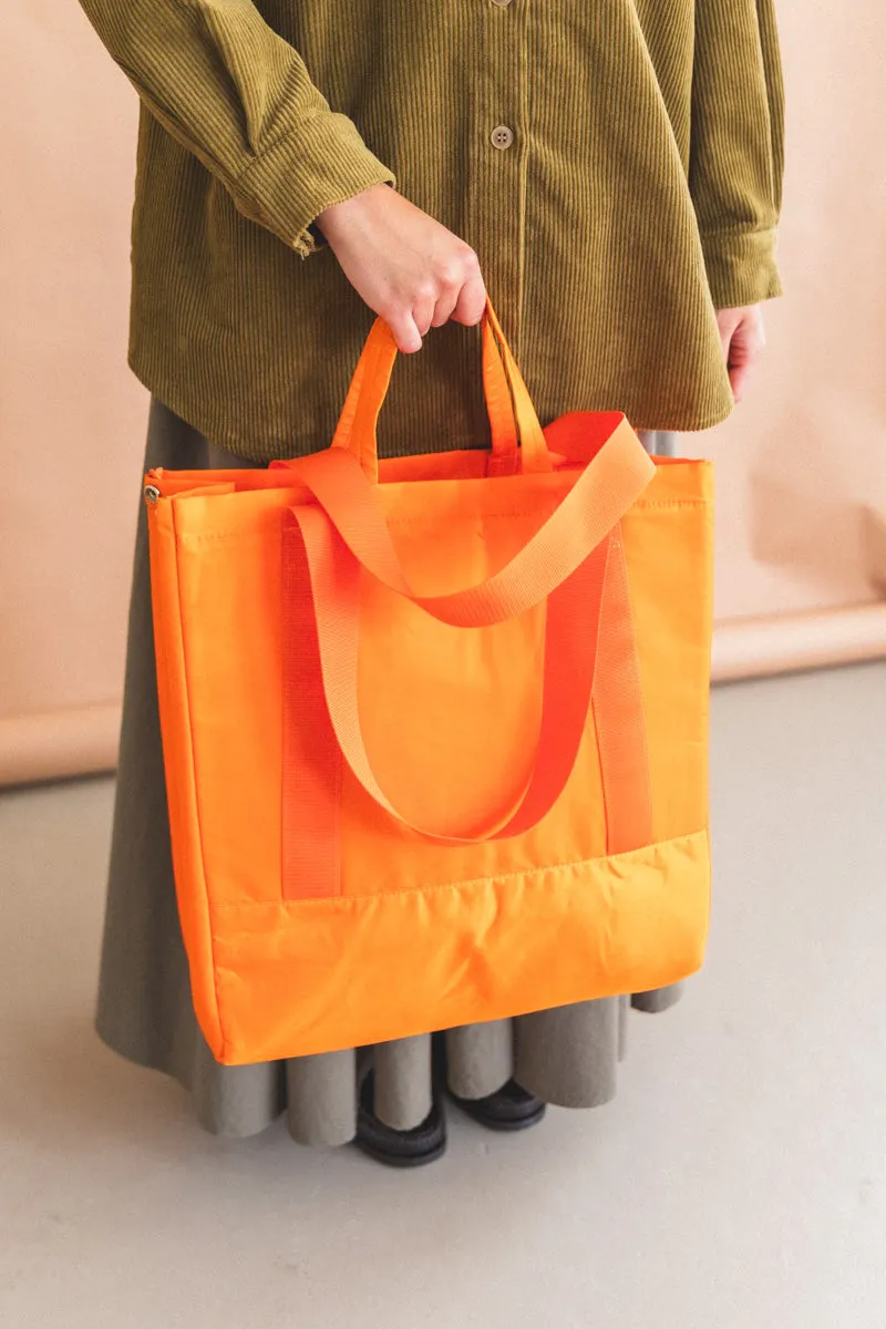 INFLUX PADDED BAG IN ORANGE