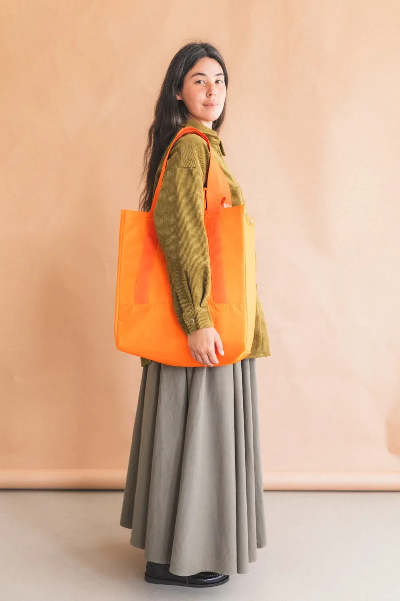 INFLUX PADDED BAG IN ORANGE