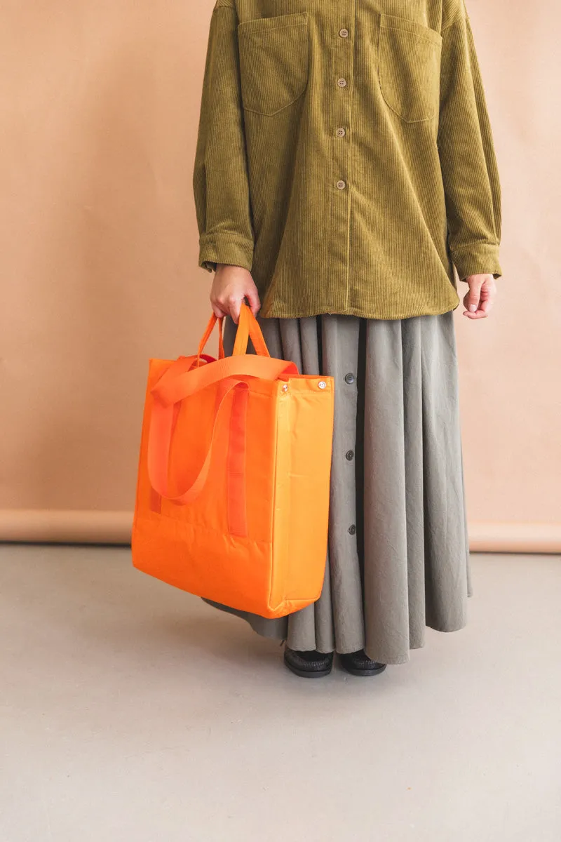 INFLUX PADDED BAG IN ORANGE