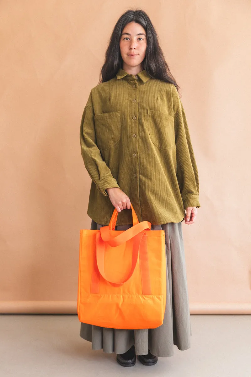 INFLUX PADDED BAG IN ORANGE