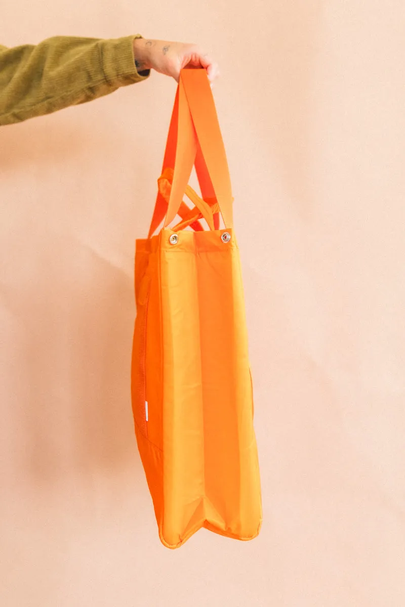 INFLUX PADDED BAG IN ORANGE