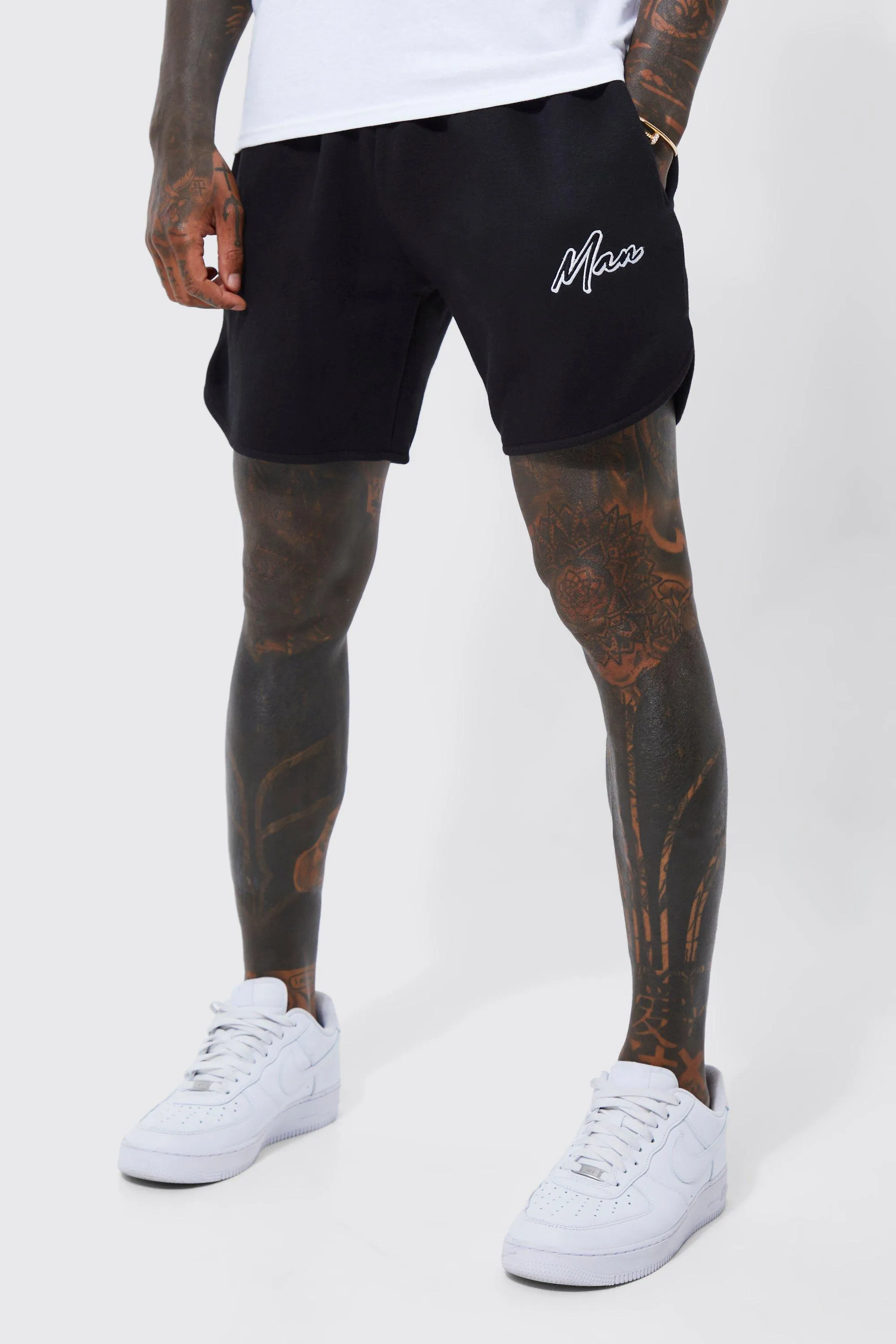 Man Short Loose Fit Curved Hem Jersey Short | boohooMAN UK