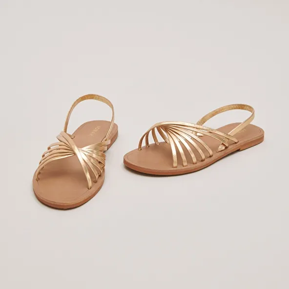 Open toe straps sandals in gold metallic leather